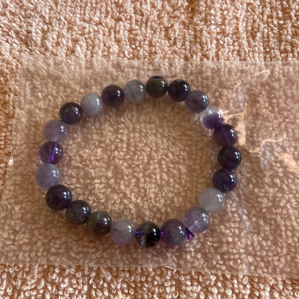 Lovely bracelet, with purple and lavender colors.